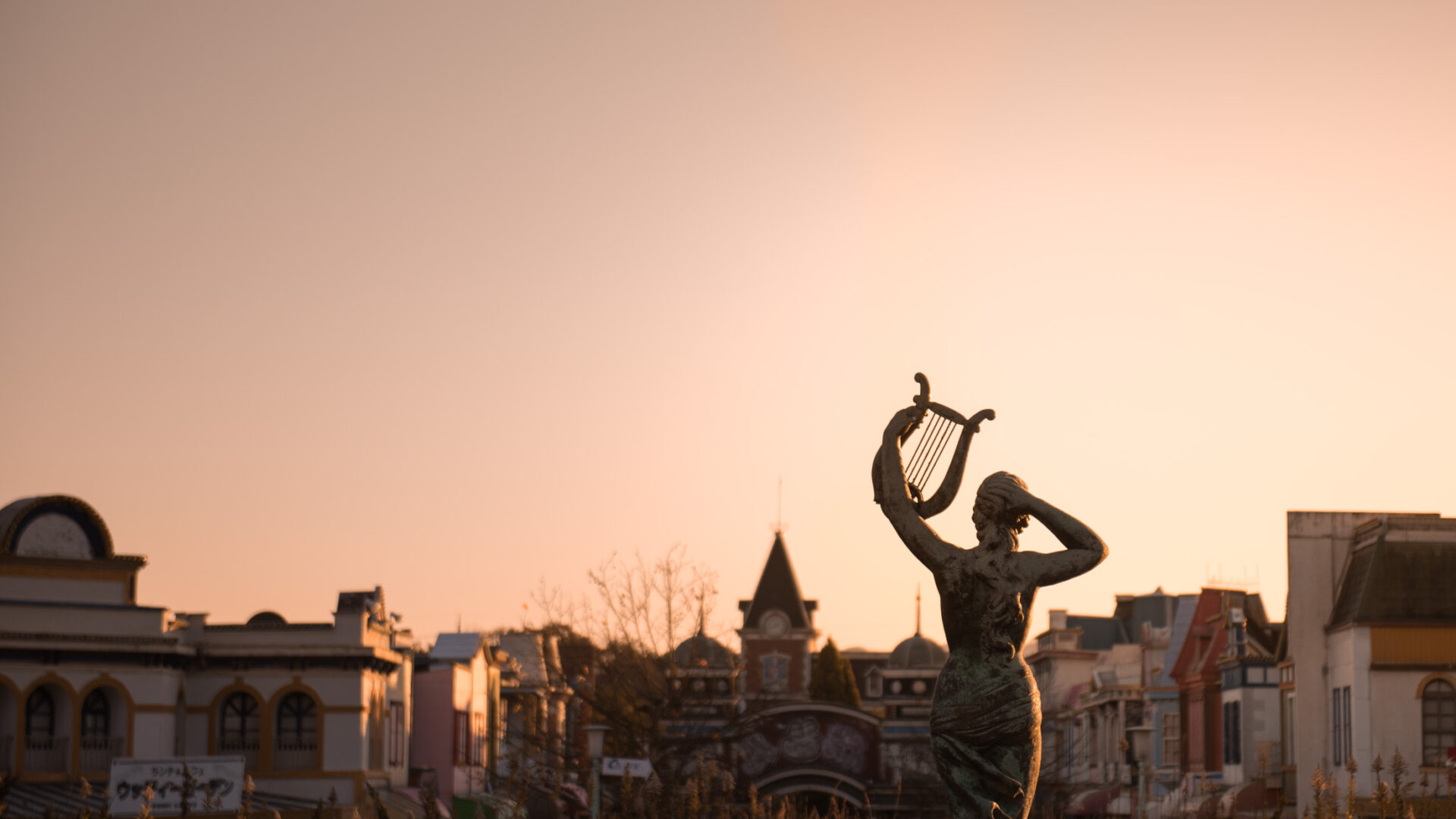 Eerie ruins of Nara Dreamland at sunset, a haunting reminder of impermanence.