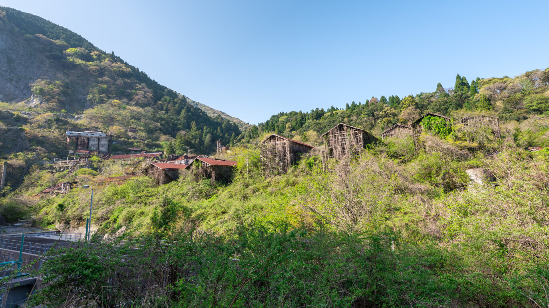 Overgrown Shiraishi Mine ruins in Kansai, Japan, the abandoned White Labyrinth industrial site.