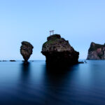 Majestic Guardian Rock Formations: Ebisu & Daikoku in a Coastal Setting.