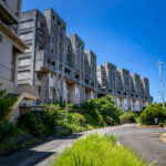 Haunting abandoned mining town overtaken by nature.