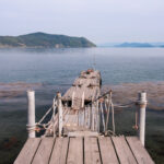 Scenic Wooden Dock on Tranquil Mountain Lake, Japan
