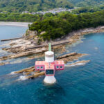 Playful pink lighthouse island paradise