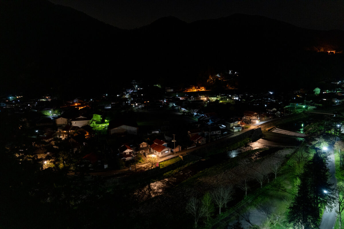 Night view of Taikodani Inari Shrine overlooking Tsuwano town lights in Japan
