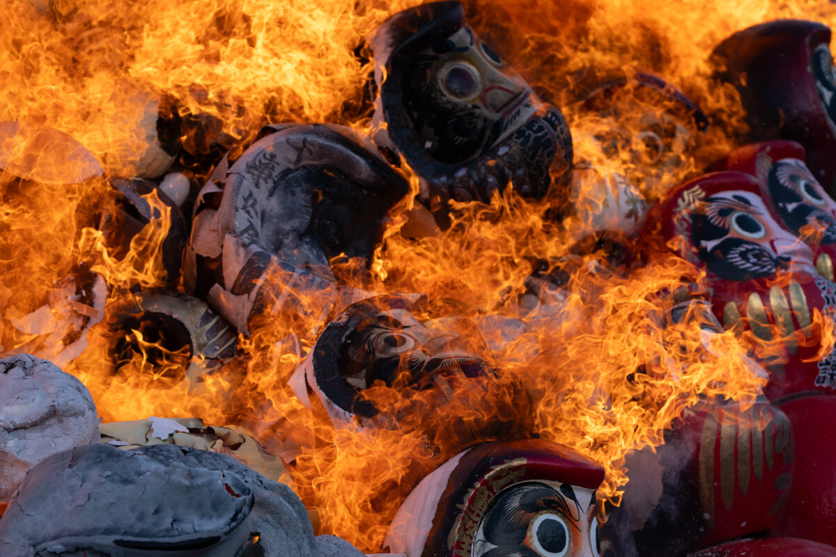 Flaming Daruma doll burning ritual at Shorinzan Temple, Japan